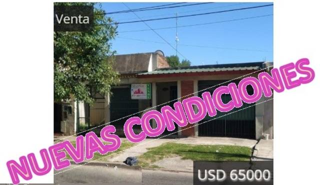 CASA CON LOCAL Y GARAGE