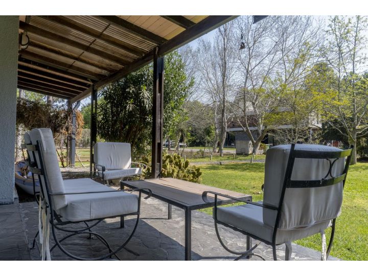 Puerto Paraiso. Casa de 2 dormitorios con parque.