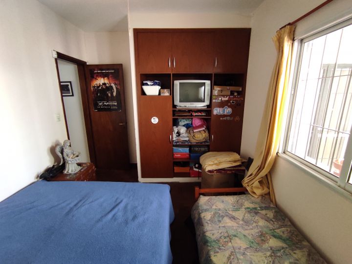 Venta Casa 2 Dormitorios con Amplio Terreno en Barrio Belgrano