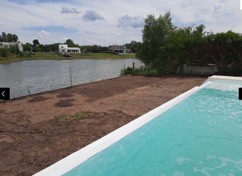 CASA VENTA EL CANTON AL AGUA A ESTRENAR 4 DORMITORIOS PILETA GALERIA PARRILLA A LA LAGUNA